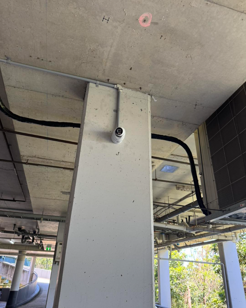 Security camera on apartment basement pillar